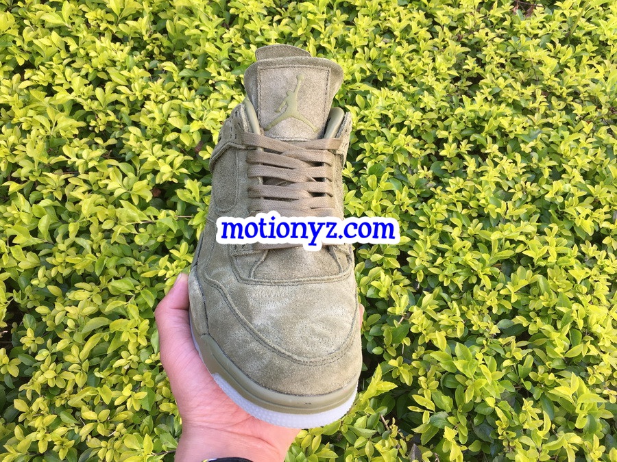 Kaws x Air Jordan 4 Dark Green